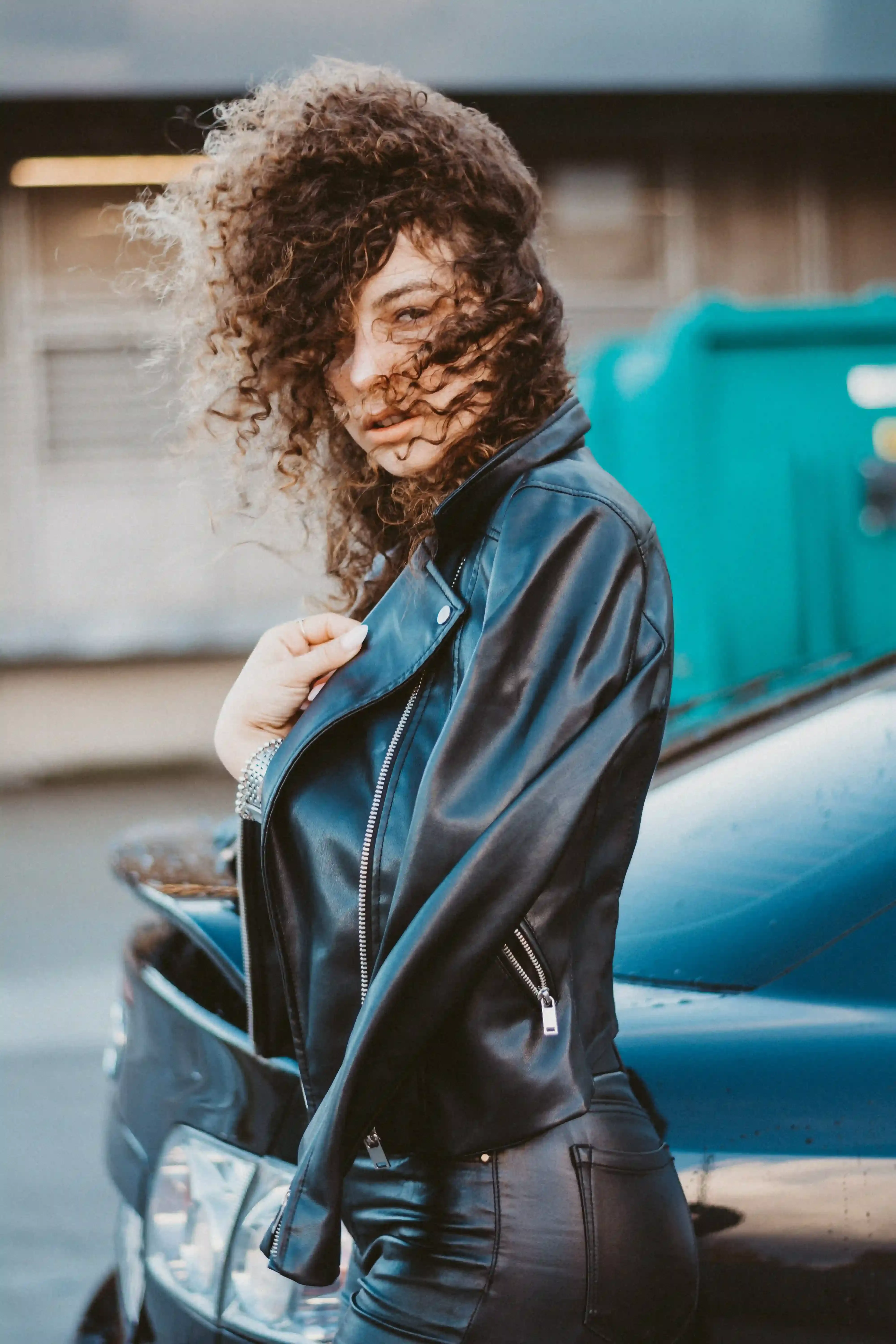 

An image of a woman with long, healthy-looking hair, using a natural shampoo product.